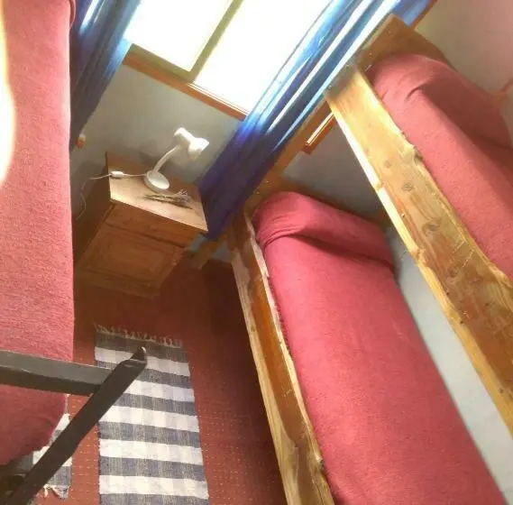 Neljän hengen Economy-huone jaetulla kylpyhuoneella, Piuke Mapu Patagonia Hostel