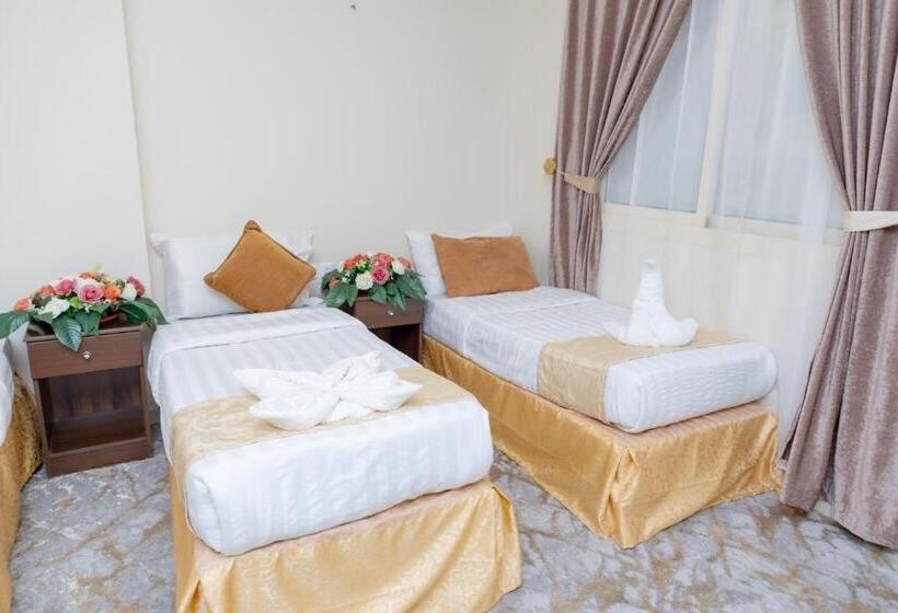 이코노미 룸, فندق تاج