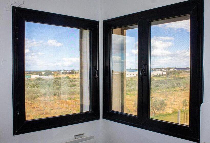 בונגלו משפחתי, L écrin De Paradis