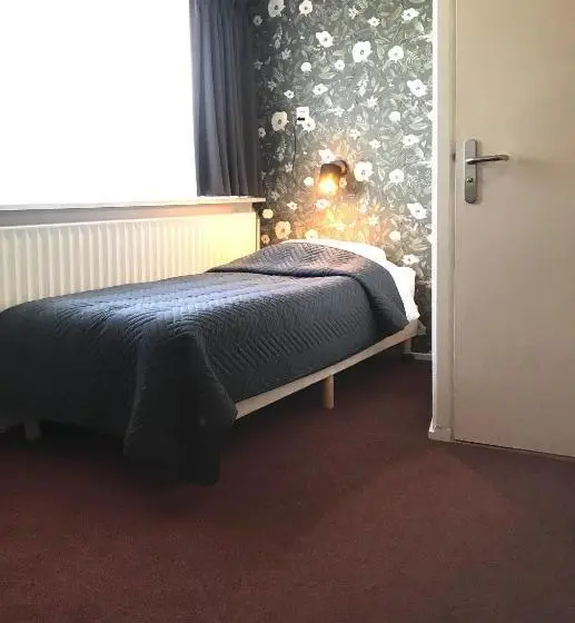 Chambre Triple Confort, Norg