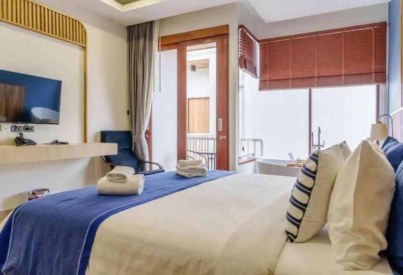 キングサイズベッドのスタンダードルーム, เดอะซีน คาบาน่า บีช รีสอร์ท ขนอม The Scene Cabana Beach Resort Khanom