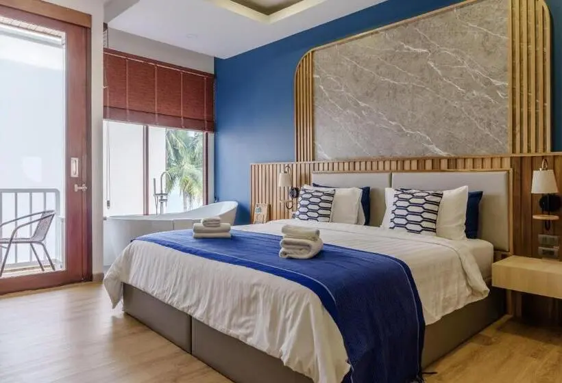 キングサイズベッドのスタンダードルーム, เดอะซีน คาบาน่า บีช รีสอร์ท ขนอม The Scene Cabana Beach Resort Khanom