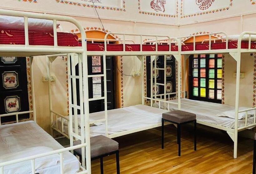 共用房间的床, Rudra Home Stay Paying Guest House