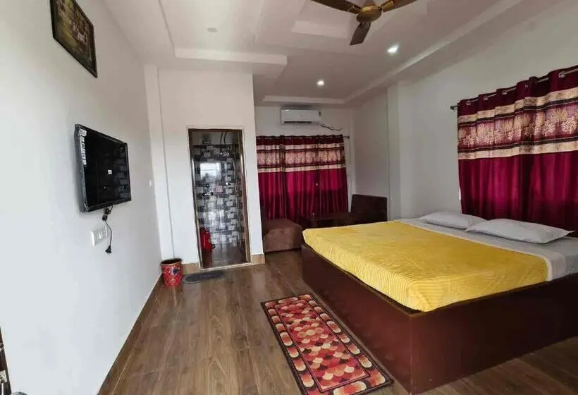 キングサイズベッドのデラックスルーム, Gangotri Resort