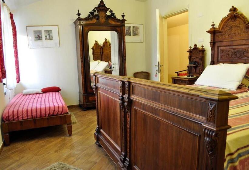 חדר דלוקס לשלושה, Le Macine Relais