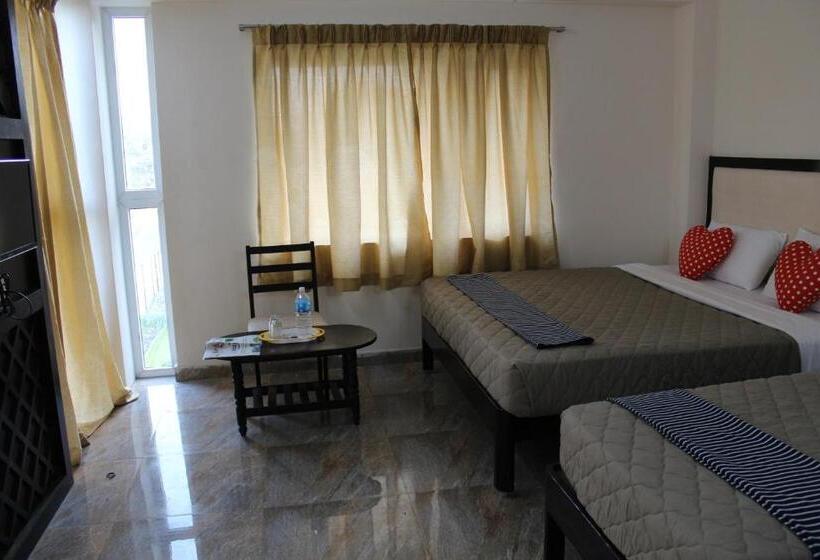 חדר אקזקיוטיב לשלושה, Jaidharshini Palace