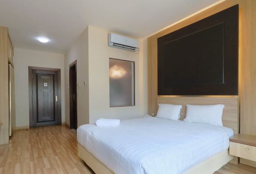 Quarto Deluxe, Mutiara Suites
