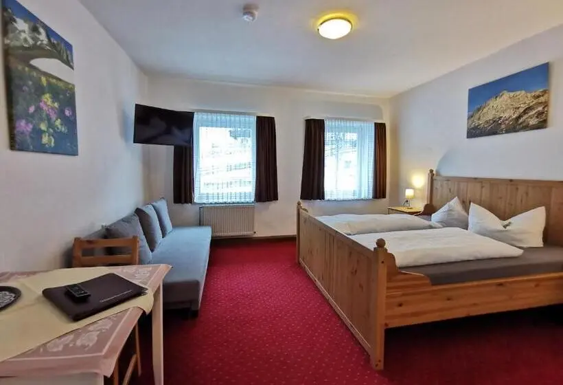 Quarto Estandar, Garni Post