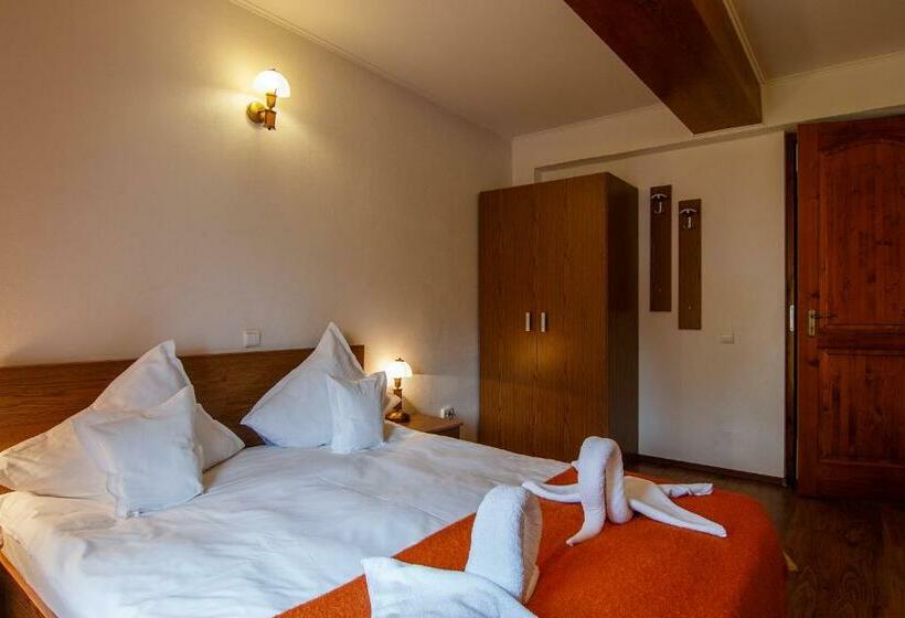 غرفة قياسية, The Guesthouse