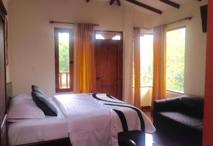 غرفة قياسية رباعية مطلة على الحديقة, Hosteria Campestre San Fermin