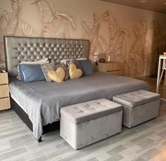 Quarto Deluxe com Sacada, Bahia 79 Apartasuites Cerca Al Centro