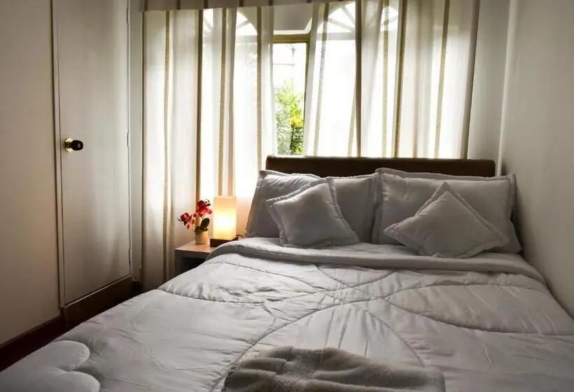 庭の見えるシングルルーム, Casa Iris