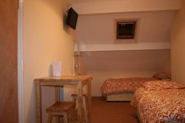 غرفة رباعية اقتصادية مع حمام مشترك, Bayside Guest House