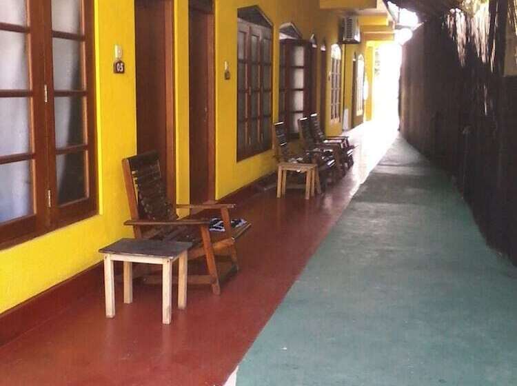 Deluxe Rum, Malika's Yellow House