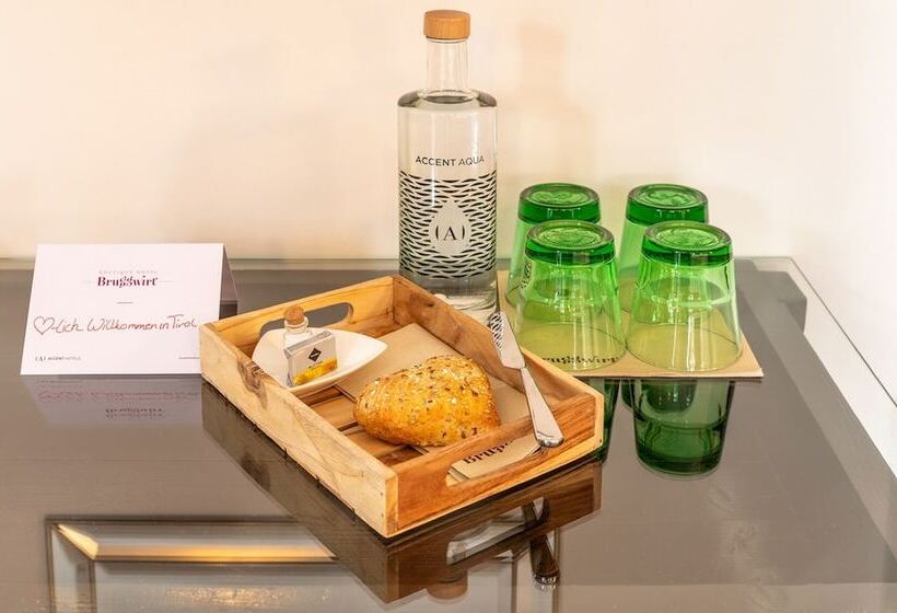 غرفة ديلوكس, Bruggwirt