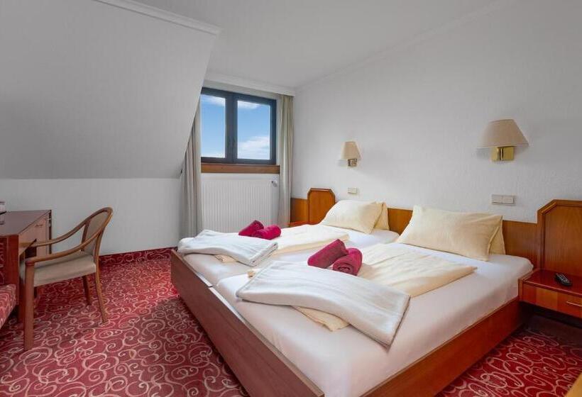 Номер Стандарт, Schomacker