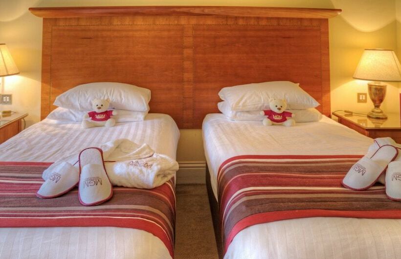 エクゼクティブルーム, Muthu Newton