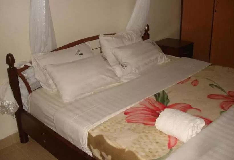 سوییت, Acholi Inn
