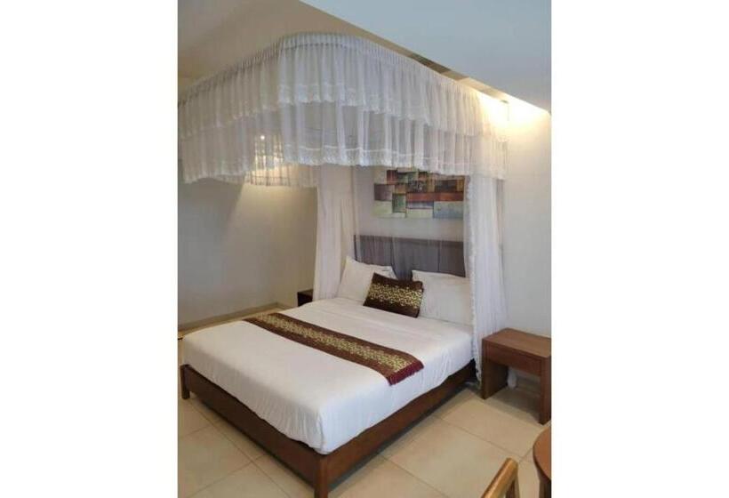 اتاق استاندارد, Acholi Inn