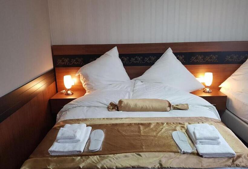 חדר סטנדרט לשלושה, Im Anker