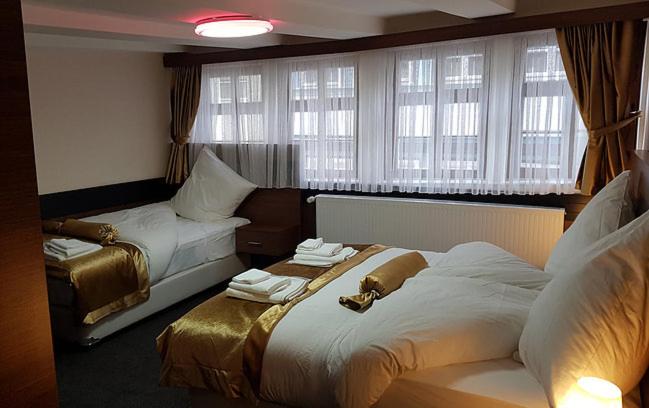 חדר סטנדרט לשלושה, Im Anker