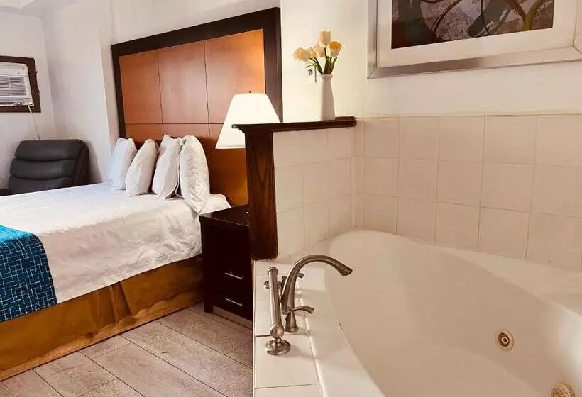 キングサイズベッドのデラックスルーム, Travelodge By Wyndham Valleyfair Shakopee