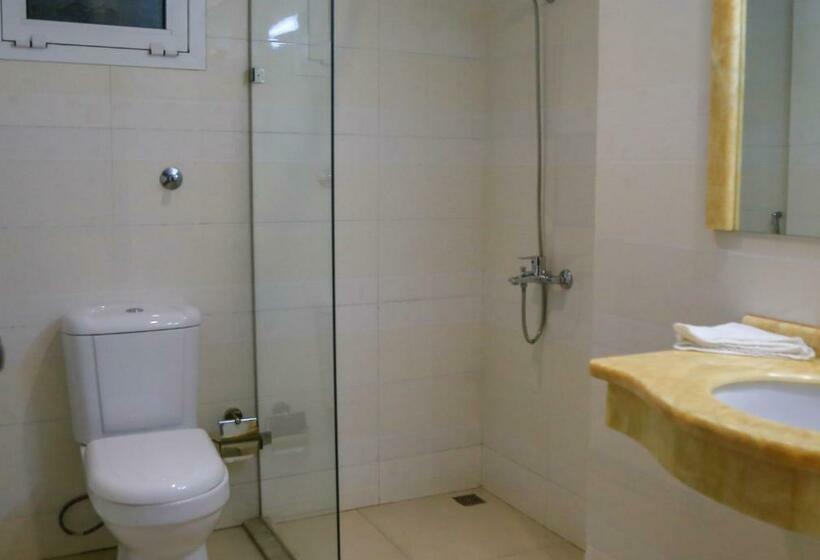 اتاق استاندارد یک نفره, Muscat Inn