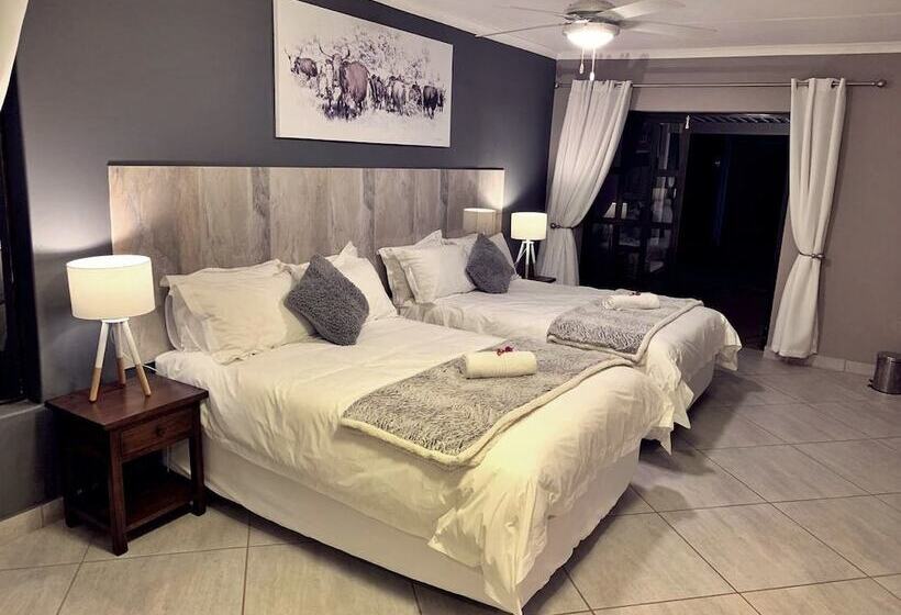 חדר משפחתי, The Wilds Guest House