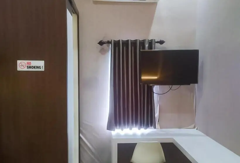 Standard Yhden Hengen Huone, Reddoorz Syariah Near Sultan Syarif Kasim Ii Airport