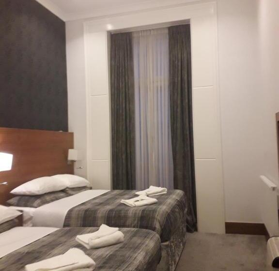 غرفة قياسية رباعية, Leisure Inn