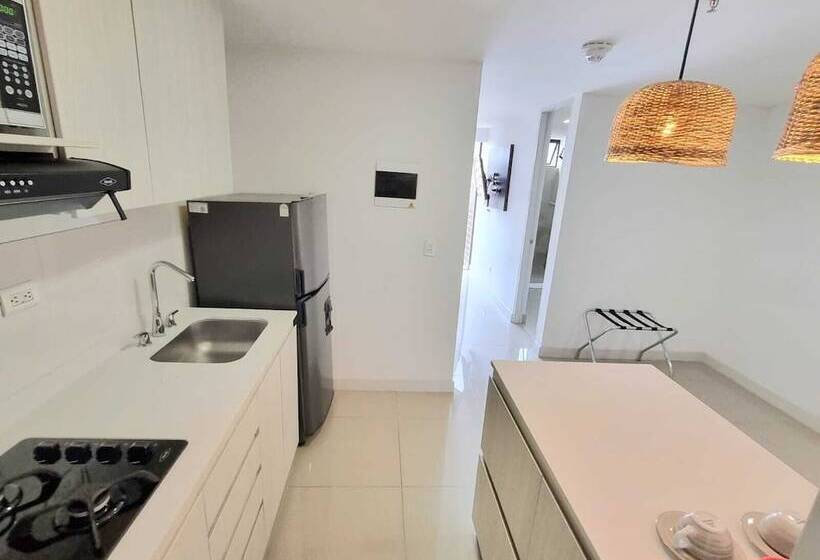 スタンダードスタジオ, Origen Local Suites