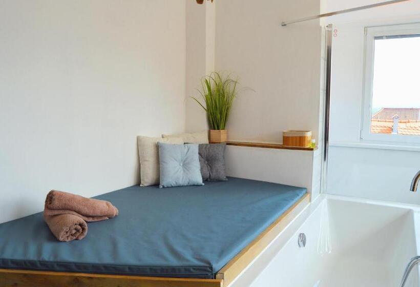 침실 1개 아파트, Dům U Lázní