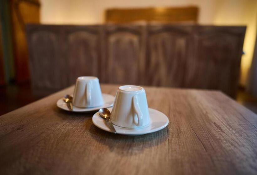 디럭스 룸, Dům U Lázní