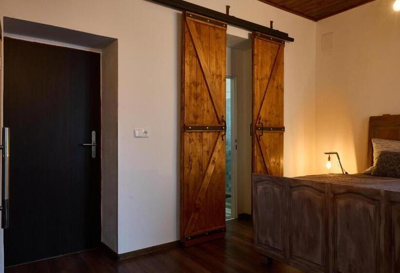 디럭스 룸, Dům U Lázní