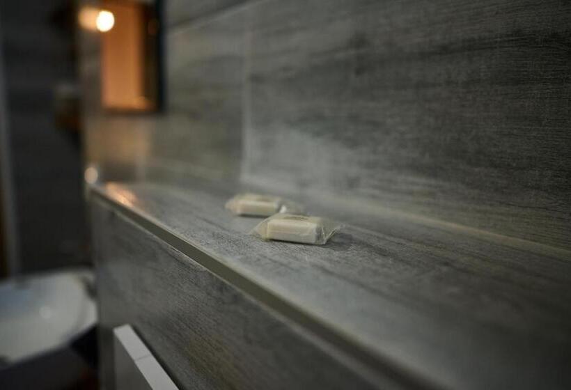 디럭스 룸, Dům U Lázní