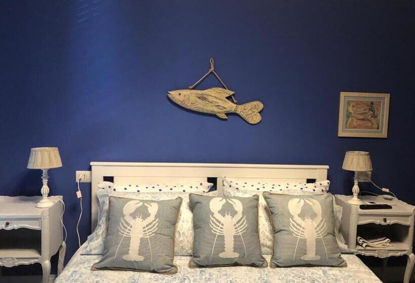 חדר סטנדרטי לארבעה עם חדר אמבטיה משותף, Le Stanze Del Borgo