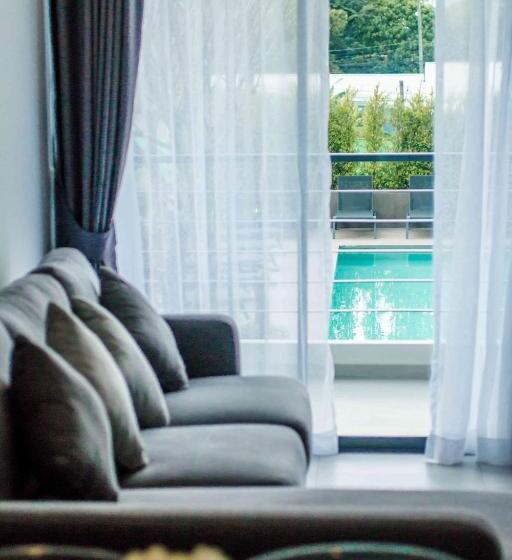 Huoneisto 1 Makuuhuone Allasnäkymä, Noon Village   Tower 2&3