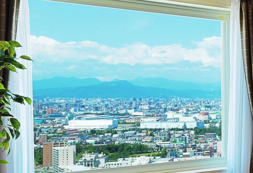 Номер Стандарт, Emisia Sapporo