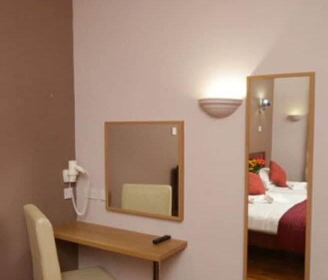 اتاق استاندارد چهار تخته, Merchant City Inn