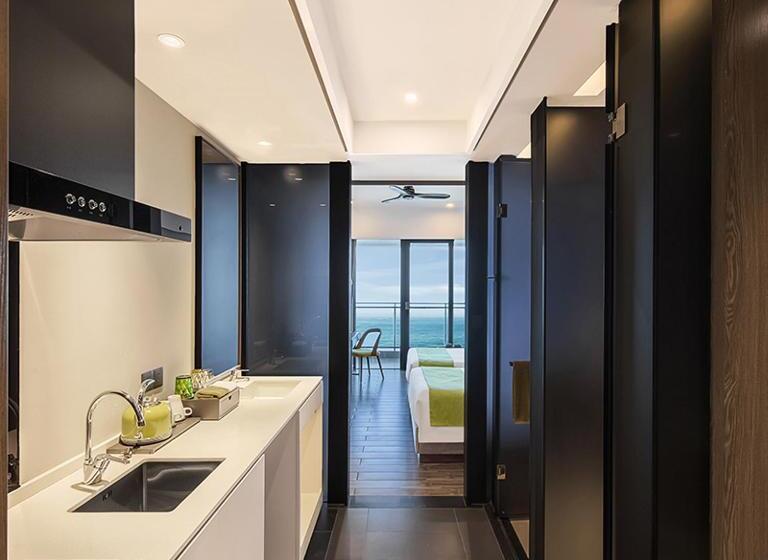 キングサイズベッドのデラックスルーム, Dusit Thani Shuangyue Bay Resort Huizhou