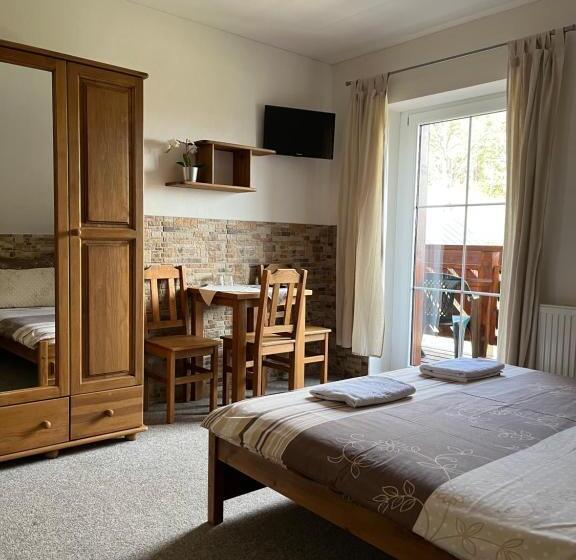 Четырехместный Номер Стандарт с Балконом, Na Planýrce