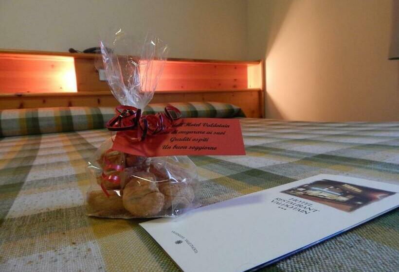 غرفة قياسية رباعية, Valdotain