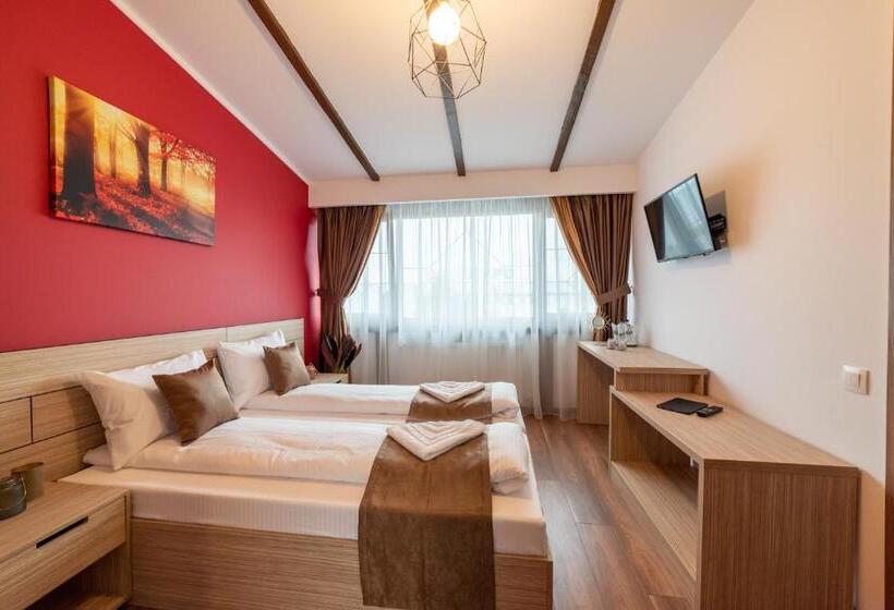 חדר דלוקס, Escala Rooms