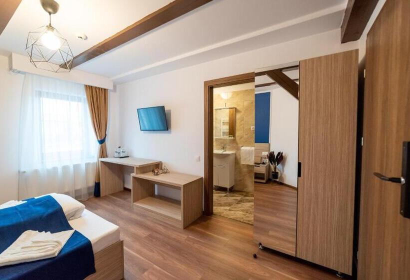 חדר דלוקס, Escala Rooms