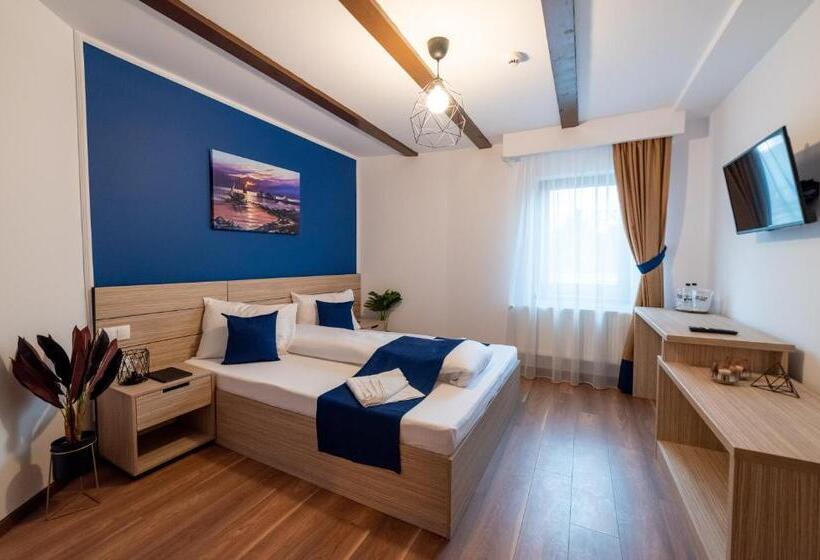 חדר דלוקס, Escala Rooms