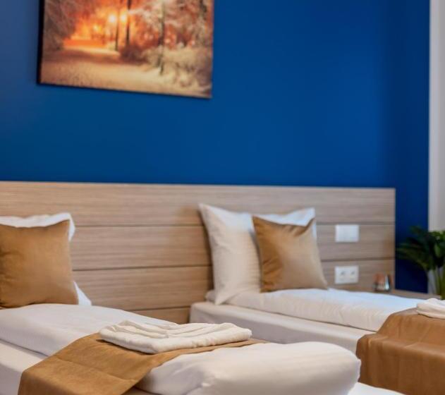 חדר דלוקס, Escala Rooms