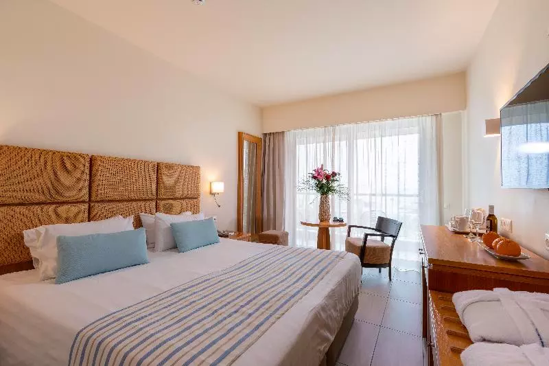 Chambre Deluxe, Minos