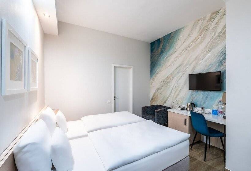 Quarto Estandar, Atrium Fashion