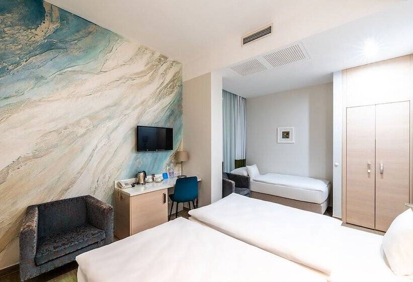 Quarto Estandar, Atrium Fashion