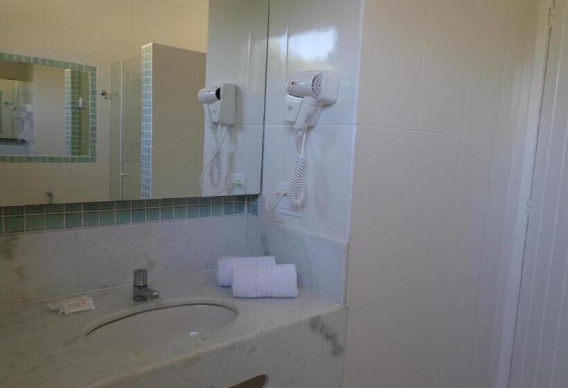 מיטת קינג בסוויטה, Pousada Dos Reis